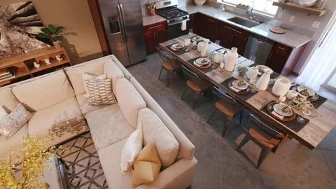 Overhead Panning Right Shot of Kitchen and Living Room Stock Footage 77168448