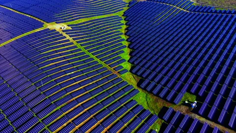 Overhead pattern of solar panel rows across field Stock Footage 340407538
