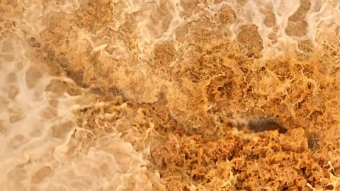 Overhead perspective shows floodwaters surging forcefully over rocks. Stock Footage 310708569