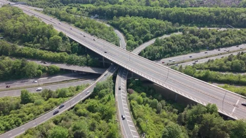 Overhead Perspective of Vehicles Moving on Major Highway Interchange Видео 336632593