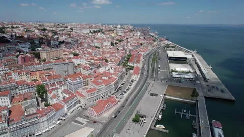 Overhead push over Tagus riverfront in Lisbon, Portugal Stock Footage 327880075