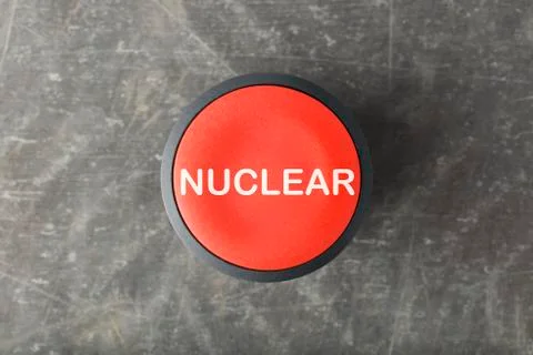 Overhead of Red 'Nuclear' Push Button on Concrete Background Stock Photos