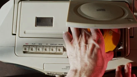 Overhead Remove CD from Old Player 스톡 동영상 106396132