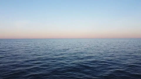Overhead reverse shot above calm lake Stock Footage 132641974