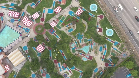 Overhead rotating Drone aerial of Mini Golf Course in California Stock Footage 174965334