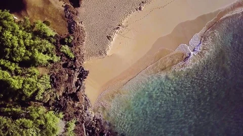 Overhead Rotating Right View Of Waves Crashing On A Sandy Beach Video stock 83959985