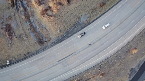 Overhead rotating shot looking down on traffic on winding Provo Canyon highway 스톡 동영상 242825075