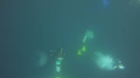 Overhead Scuba Divers Oxygen Bubbles Rising Up Towards Surface, Galapagos Stock Footage 108339902