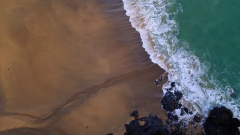 Overhead Shot of Beach and Cliffs. Stock Footage 129099299
