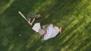 Overhead Shot Of Father And Son Playing Baseball Stock Footage