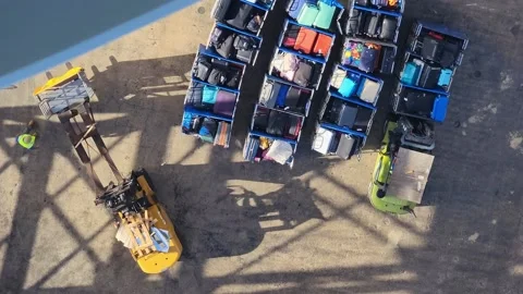 Overhead Shot of Forklift Loading Luggage Stock Footage 237396687