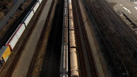 Overhead shot of a line of cargo train cars in the North Vancouver trainyard. Stock Footage 101756688
