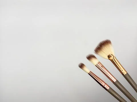 Overhead shot of makeup brushes set isolated on white background with copyspace Stock Photos