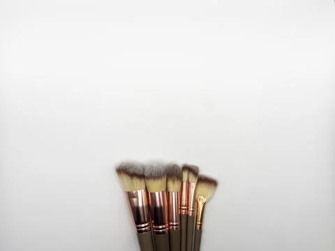 Overhead shot of makeup brushes set isolated on white background with copyspace Stock Photos