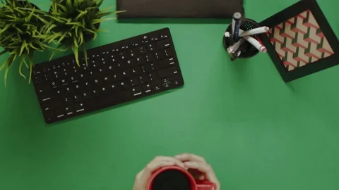 Overhead shot of man having video chat while drinking coffee Stock Footage 81231846