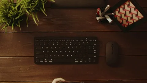 Overhead shot of man playing on computer by using gamepad Stock Footage 81184063