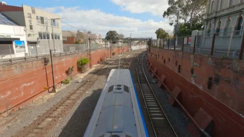 Overhead shot of Melbourne train moving through shot, 4K Stock Footage 138680942