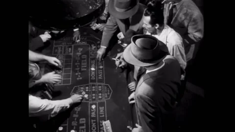 Overhead shot of men playing craps Stock Footage 260256993