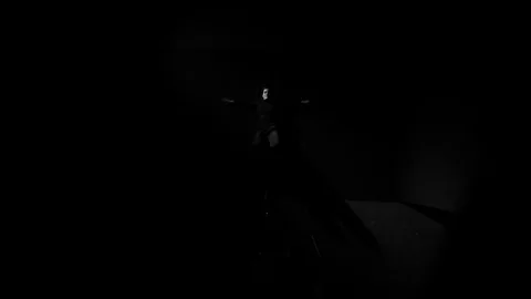 Overhead shot of modern dancer doing floor work in black and white Stock Footage 98671441