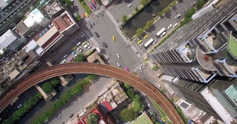 Overhead Shot Of Road Junction And Sky Train In Silom District, Bangkok, Video stock 79550879
