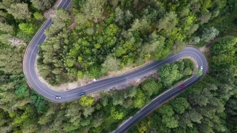 Overhead shot of rounded, wild road Stock Footage 143940447