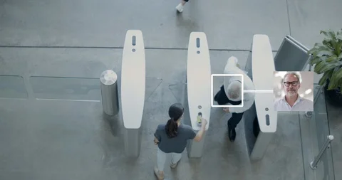 Overhead shot of security gates identifying people at entrance Stock Footage 123404149