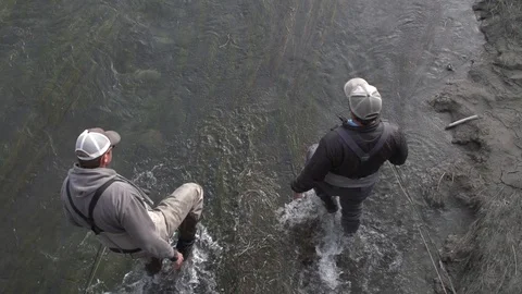 Overhead shot slow motion two fishermen Stock Footage 90660135