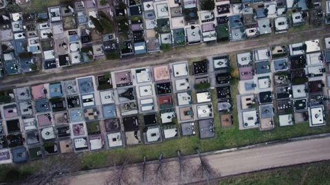 Overhead shot of a small city old graveyard near the old church Stock Footage 185417084