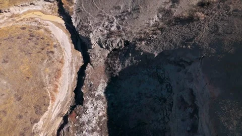Overhead shot of steep bluff next to Indian river Stock Footage 306092754