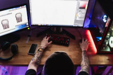 Overhead shot of an unrecognizable professional editor creating content in .. Stock Photos