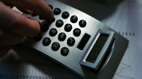 Overhead shot, using calculator Video stock 61820032