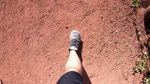 Overhead Shot Walking Along Red Dirt Path, Galapagos Ecuador Stock Footage 127658385