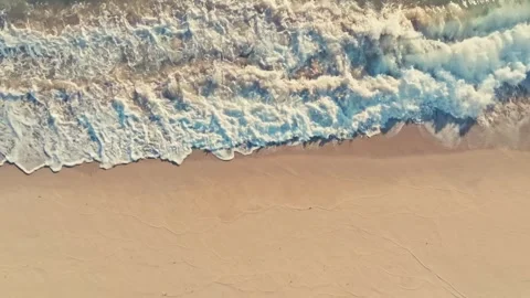 Overhead shot of waves breaking on beautiful tropical beach Florida Mexico Stock Footage 280507546
