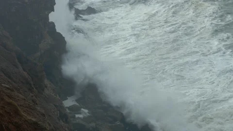 Overhead shot of waves crashing against the reef Stock Footage 230970055