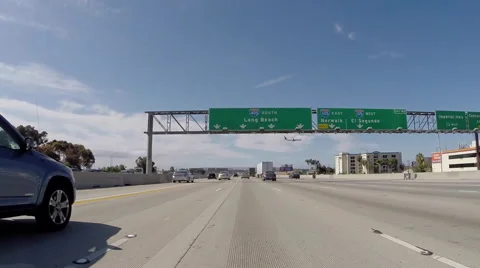 Overhead Sign on the San Diego 405 Freeway South towards Long Beach  Stock Footage