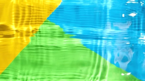 Overhead slow motion video of vibrant yellow blue and green liquid texture with  Stock Footage 344797577