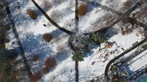 Overhead Snow in the park Video stock 83493216