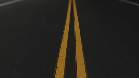Overhead of a Street Road with Solid Double Yellow Lines Stock Footage