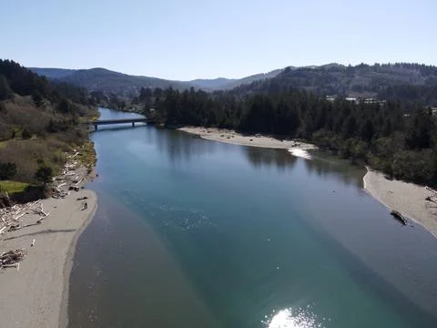 Overhead of sun cast on river Foto stock