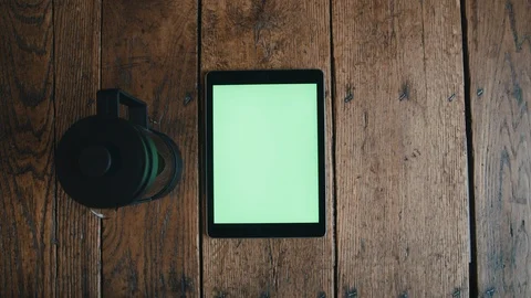 Overhead of tablet with coffee mug and french press Stock-Footage 97750617