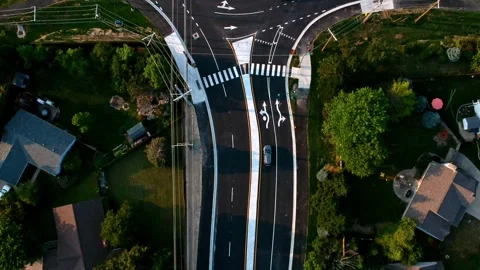 Overhead top down of traffic circle during Golden Hour Stock Footage 155083654