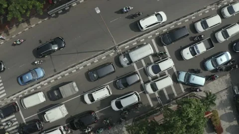 Overhead top down view of gridlock traffic in Jakarta Indonesia drone aerial Stock Footage 148868735