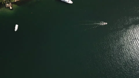 Overhead Top Down View, Oceanfront Holmes, Boats and Jungle Forest Below, 4k Stock Footage 239686143