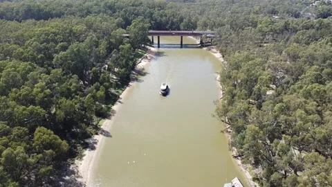 Overhead top down view of old steam powered boats running tourists along the  Stock Footage 155178152