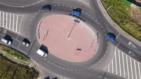 Overhead top view of roundabout car traffic Stock Footage 140919767