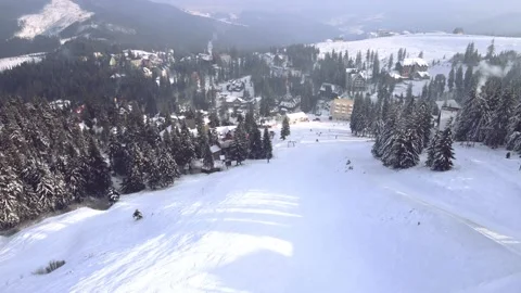 Overhead top view of snowed mountains slope Stock Footage 165164233