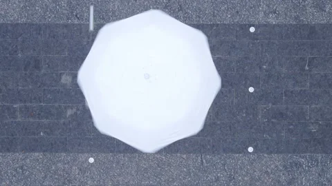 Overhead top view of white umbrella rainy weather Stock Footage 153108752