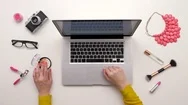 Overhead Top View Of Woman Testing Compact Powder And Using Laptop Stock Footage
