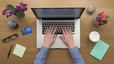 Overhead Top View Of woman Using Laptop And Credit Card Stock Footage 79650527