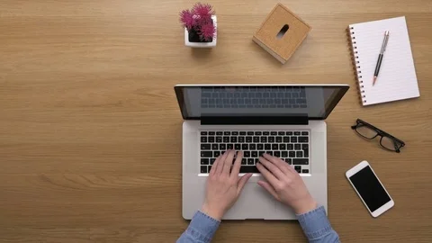 Overhead Top View Of woman Using Laptop At Desk Stock Footage 79650633